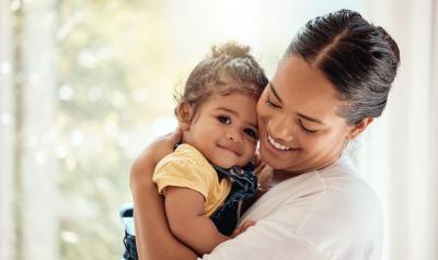 a mother holding her child