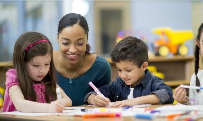 Students coloring at their desks