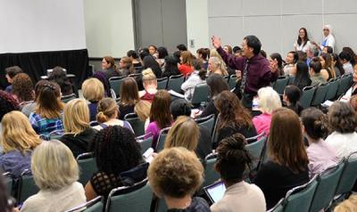 Group of people attending a conference