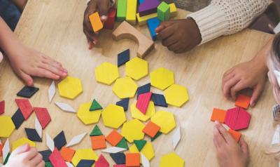 Children playing with shapes