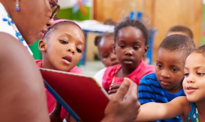 Children reading in a circle