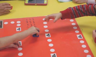 Two children playing math game