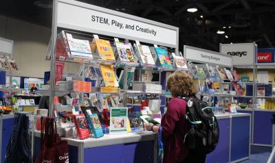 conference attendees browsing at NAEYC books.