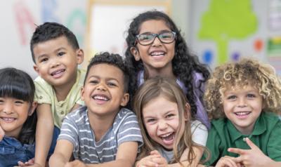 students posing for a picture and laughing