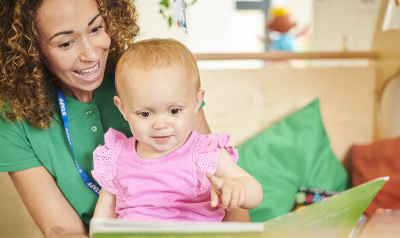 an adult reading with a child