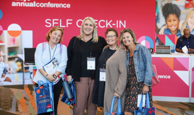 A group of Annual Conference attendee registering at AC2026