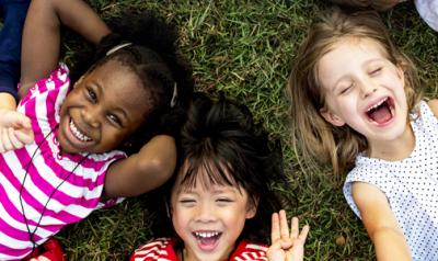 Children playing in grass