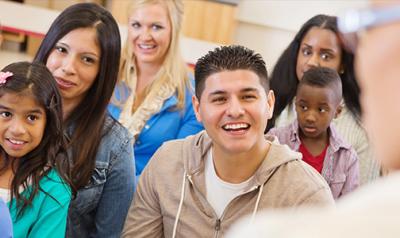 families and teachers sitting