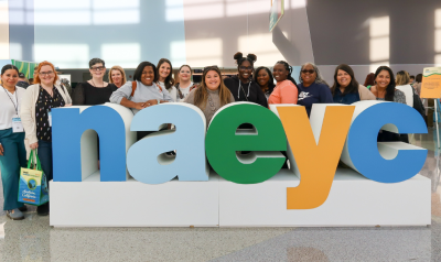 Attendees posing with NAEYC blog letters