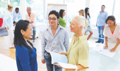 A group of teachers talking to each other
