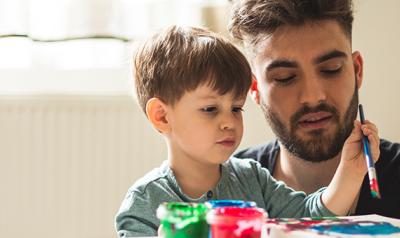 Father and son painting