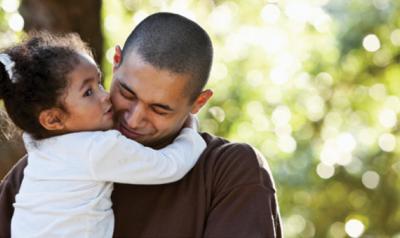 Girl hugging father