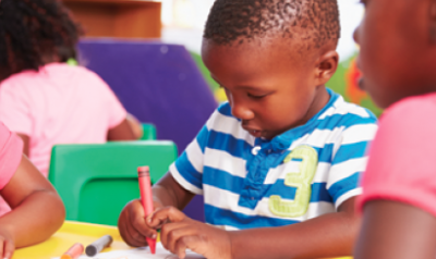 Children drawing on drawing table