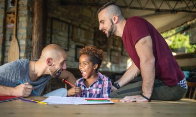 Parents working with their son.