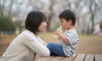 A mother interacting with her son.