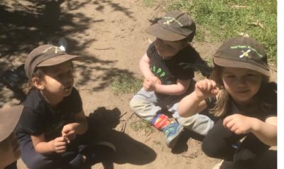 Children sitting on the ground