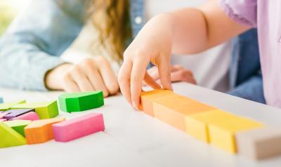 a child playing with blocks