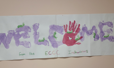 childrens artwork depicting the word "welcome"