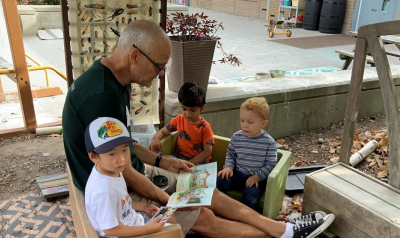 NAEYC Fall 2025 Member Spotlight Eric Unrau reading to children