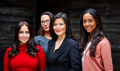 Five women standing outside