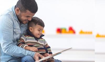 a parent reading with a child