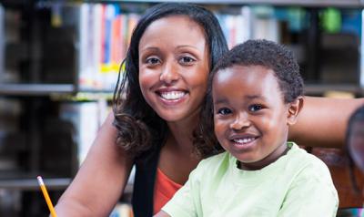 Mother and son reading.