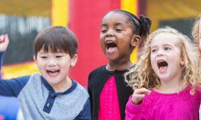 Excited children in classroom.