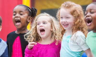 Group of young kids excited for learning