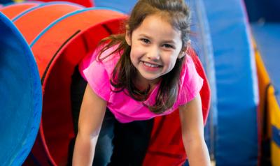 Young girl smiling during play