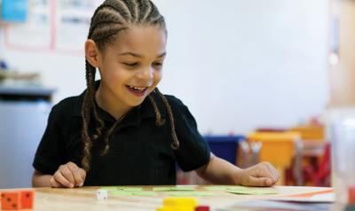 Child enjoying math activities.