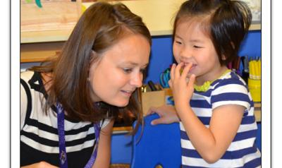 Teacher listening to a child's story