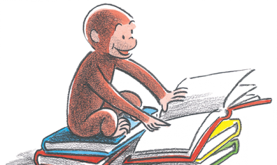 Curious George reading a book