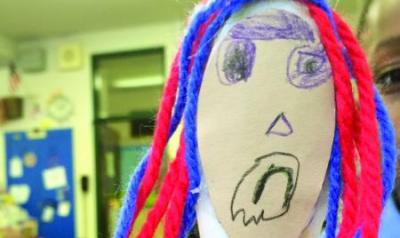 Children create peace puppets to support their developing social and emotional skills