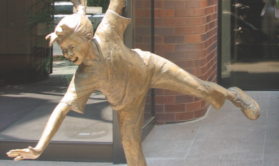 Golden child statue outside NAEYC headquarters