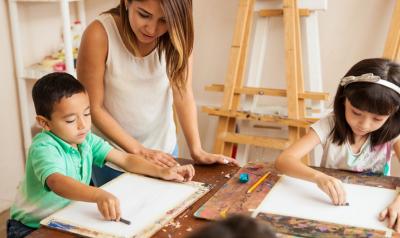 Children drawing in an art studio