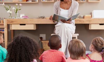 Teacher reading to preschool class