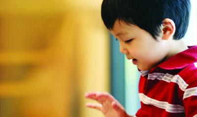 Child reading out loud.