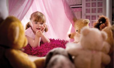 Child and her stuffed animals