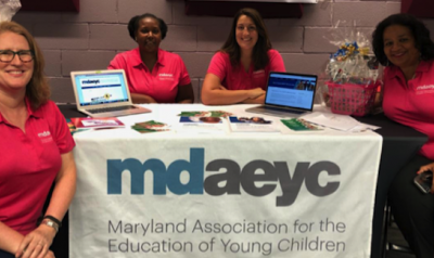 MDAEYC affiliate leaders sitting at table