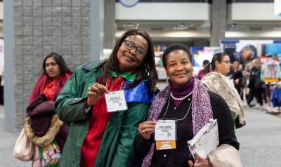 Two women pose for a picture at NAEYC's Annual Conference