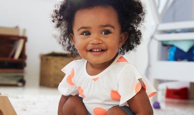 Little girl playing in play room