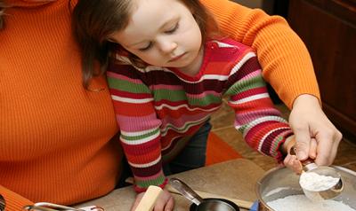 Mother and daughter baking