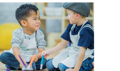 Two boys painting