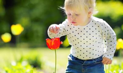 child with flower