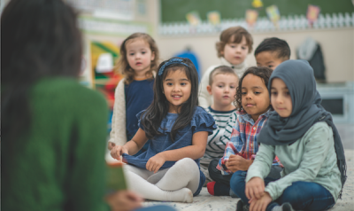 Diverse group of students sitting in a classroom