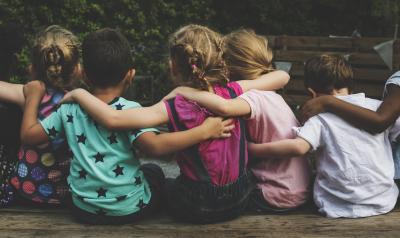 Group of children hugging each other