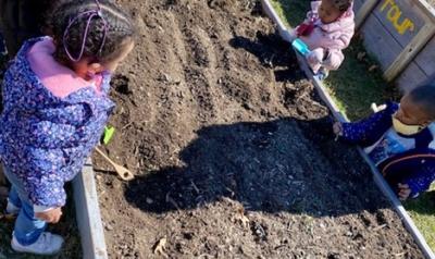 children playing in a garden