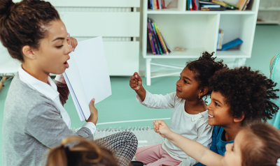 a teacher reading to children