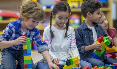Children playing with blocks in the classroom