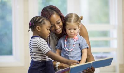 Teacher reading to students in a classroom